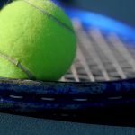Tennis_ball_on_racquet_Wimbeldon_Redcliffe_Cruise_Travel